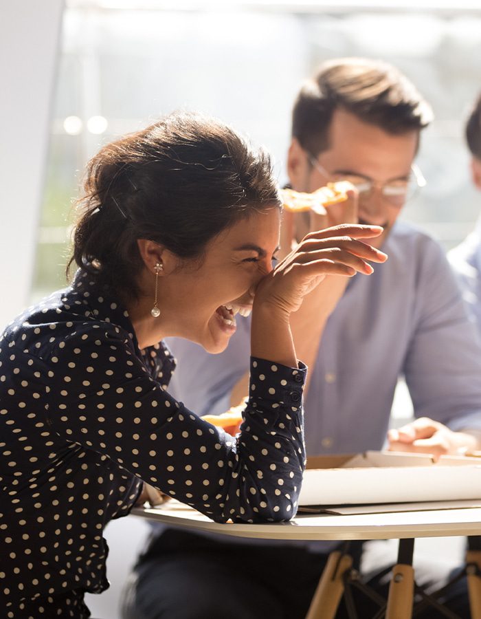 a couple of people sitting at a table