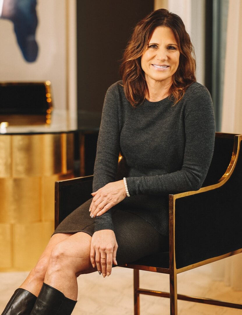 a woman sitting on a table